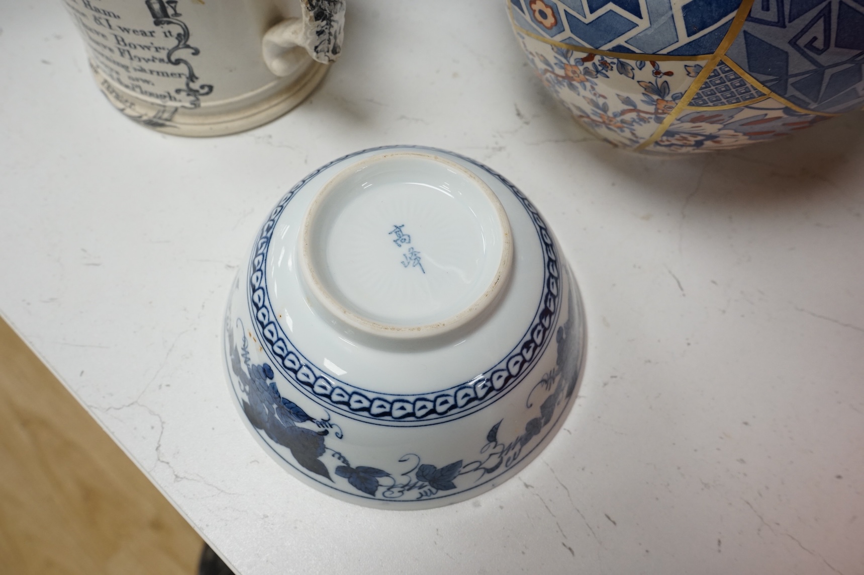 Sundry porcelain and objects to include a pair of Chinese cloisonné enamel bowls and covers, pottery twin handled printed cup and Masons vase, largest 26cm high